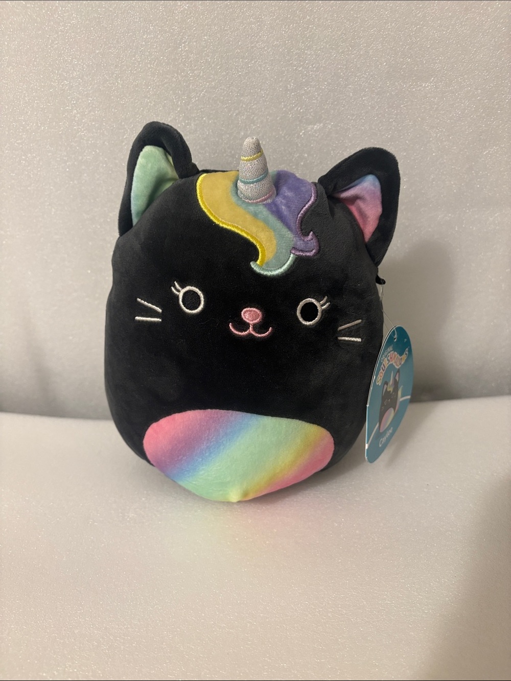 Squishmallows Black Unicorn Cat Plush with Rainbow Accents